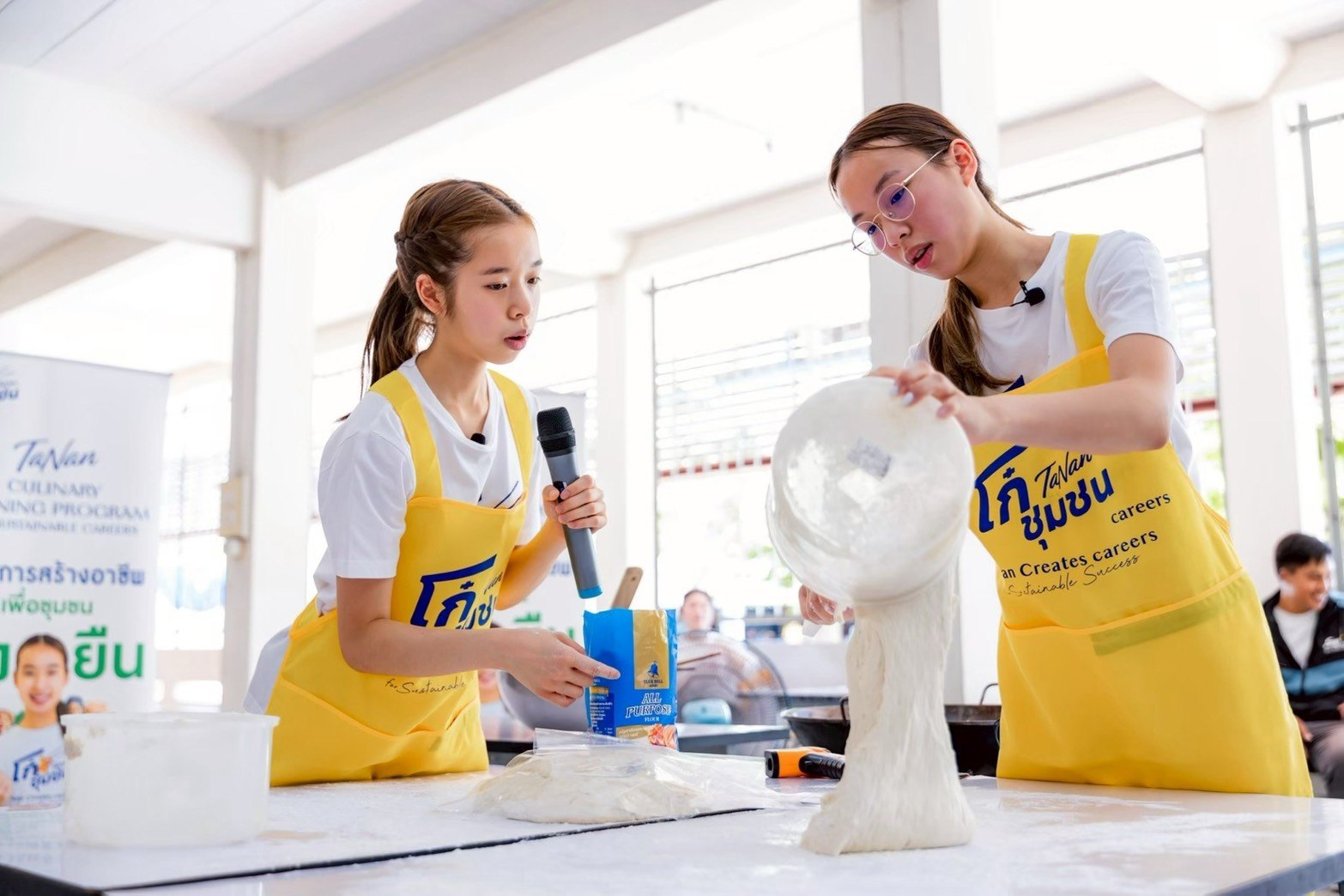 Winnie and Annie demonstrating patongko dough at Bang Mot